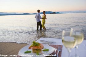 couple dining on Dunk Island beach